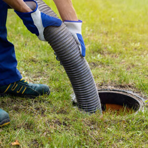 Pumping Out Household Septic Tank. Drain And Sewage Cleaning Service